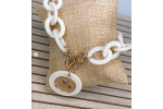 Pulsera con diseño de moneda blanca