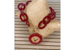 Pulsera con diseño de moneda roja