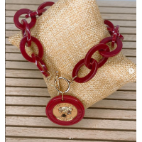 Pulsera con diseño de moneda roja